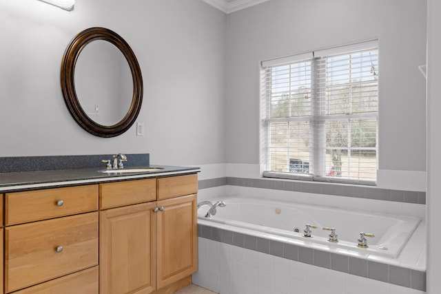 bathroom with vanity and tiled bath