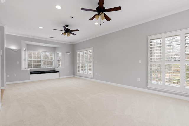 unfurnished living room with light carpet, ornamental molding, and ceiling fan