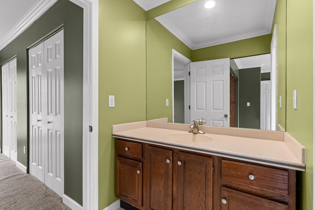 bathroom with vanity and crown molding