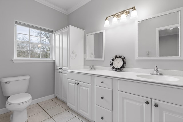 bathroom featuring tile patterned floors, ornamental molding, toilet, and vanity