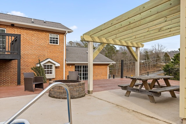 view of patio with a deck and a pergola