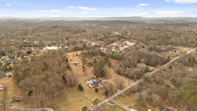 birds eye view of property featuring a mountain view