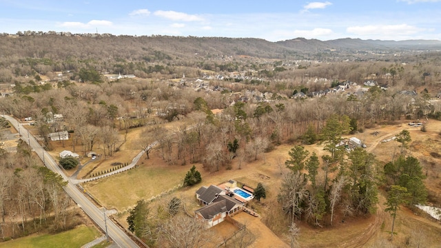 birds eye view of property featuring a mountain view