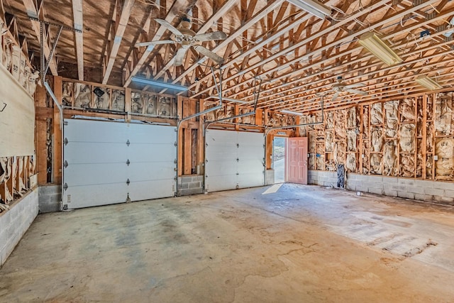 garage featuring concrete block wall