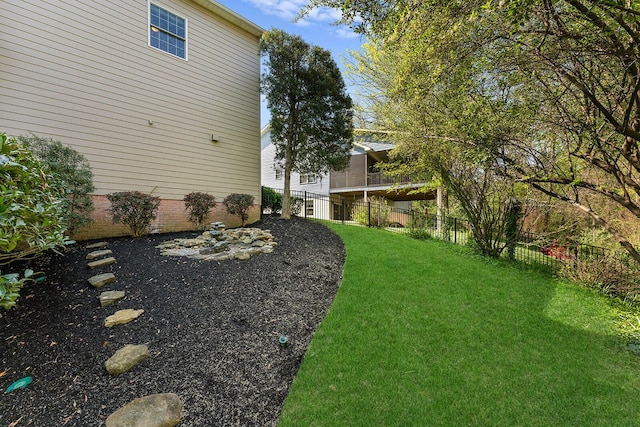 view of yard featuring fence
