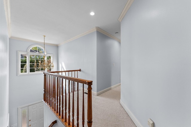 corridor featuring an upstairs landing, recessed lighting, crown molding, carpet floors, and baseboards