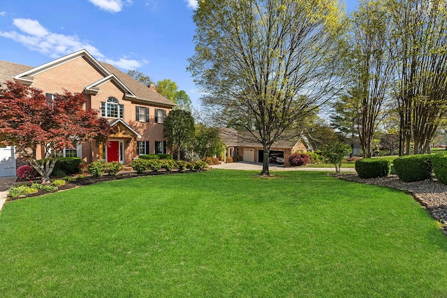 view of front of property featuring a front lawn and a chimney