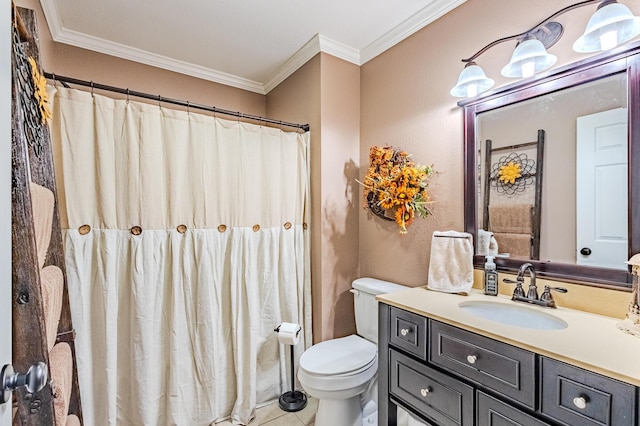 bathroom featuring ornamental molding, vanity, toilet, and tile patterned floors