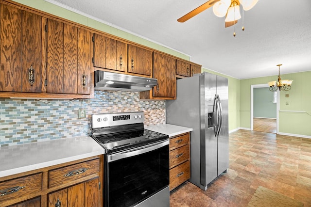 kitchen featuring ceiling fan with notable chandelier, appliances with stainless steel finishes, tasteful backsplash, a textured ceiling, and decorative light fixtures