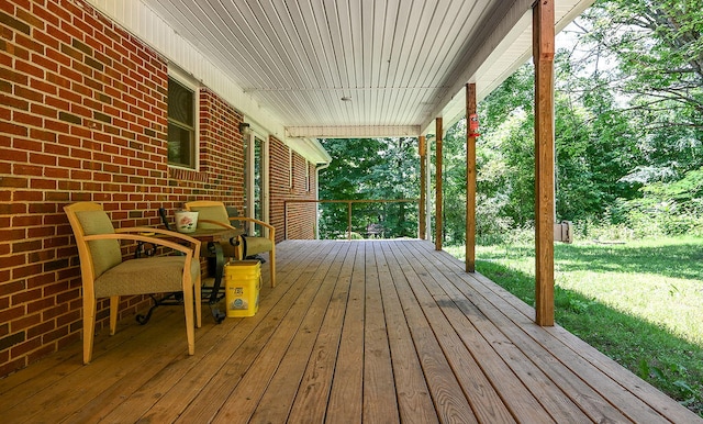 wooden terrace featuring a porch