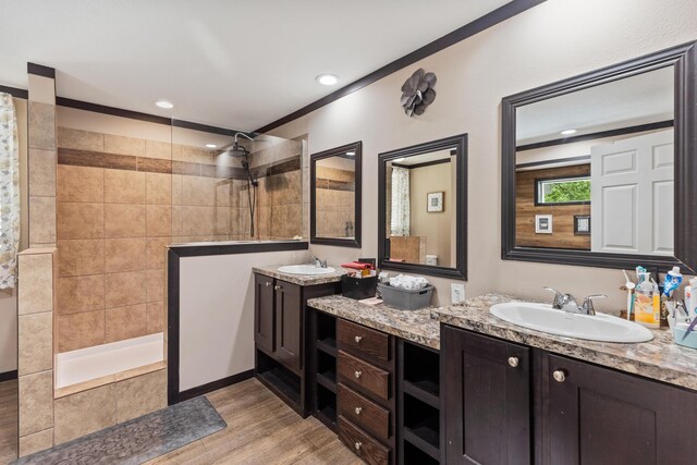 308 S Crisp Ln, Decatur, TN 37322 - full bath with a walk in shower, wood finished floors, two vanities, and recessed lighting