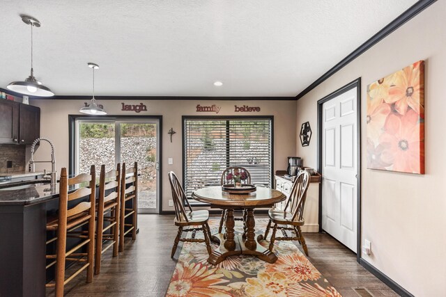 308 S Crisp Ln, Decatur, TN 37322 - dining area featuring ornamental molding, baseboards, dark wood-style floors, and recessed lighting