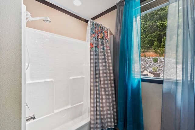 308 S Crisp Ln, Decatur, TN 37322 - bathroom featuring shower / bathtub combination with curtain