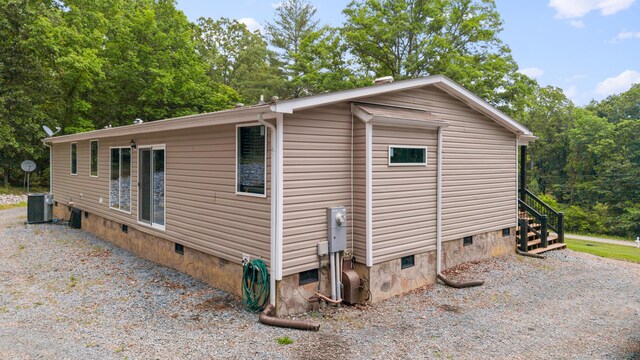 308 S Crisp Ln, Decatur, TN 37322 - view of side of home featuring crawl space and central AC