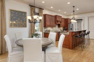 2560 Spring Creek Dr NE Lot 2 & 3, Cleveland, TN 37311 - dining room with light wood finished floors, a chandelier, and recessed lighting