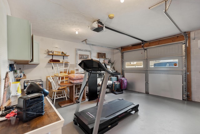 workout area with a garage
