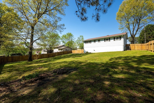 view of yard featuring a fenced backyard