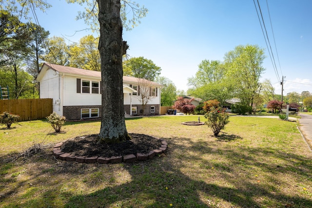 view of yard featuring fence