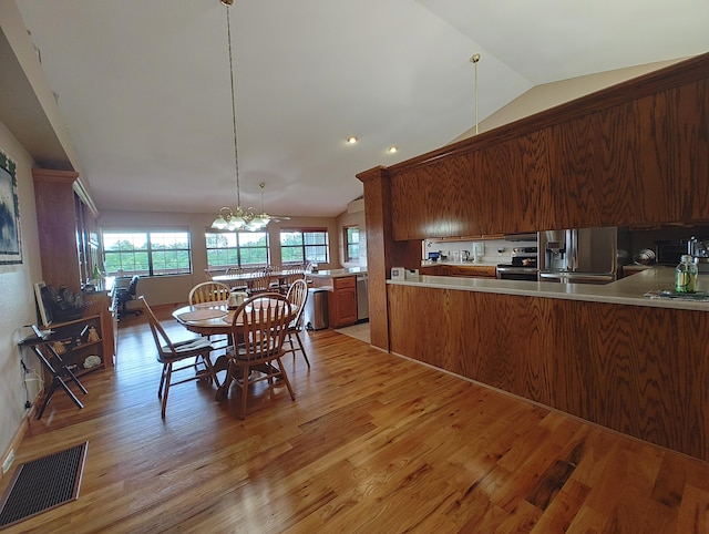 156 Pine View Ln, Copperhill, TN 37317 - dining room featuring light wood finished floors, lofted ceiling, a chandelier, and recessed lighting