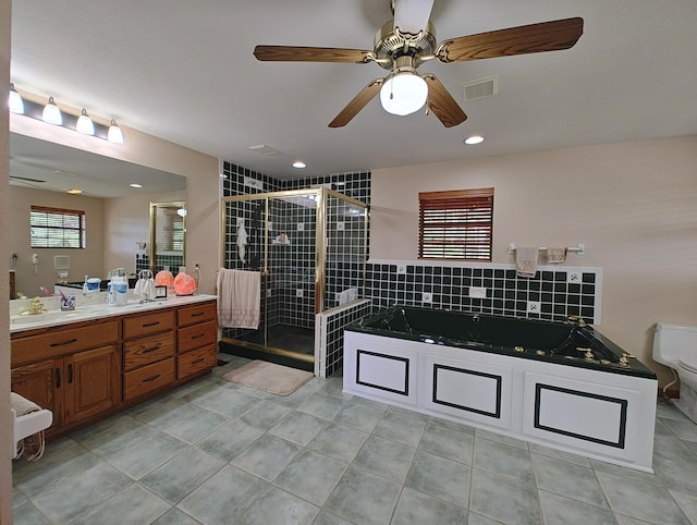 156 Pine View Ln, Copperhill, TN 37317 - bathroom with a whirlpool tub, vanity, a shower stall, tasteful backsplash, and ceiling fan
