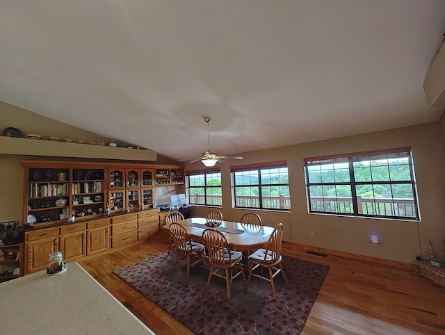 156 Pine View Ln, Copperhill, TN 37317 - dining area with light wood-style floors, lofted ceiling, and a ceiling fan