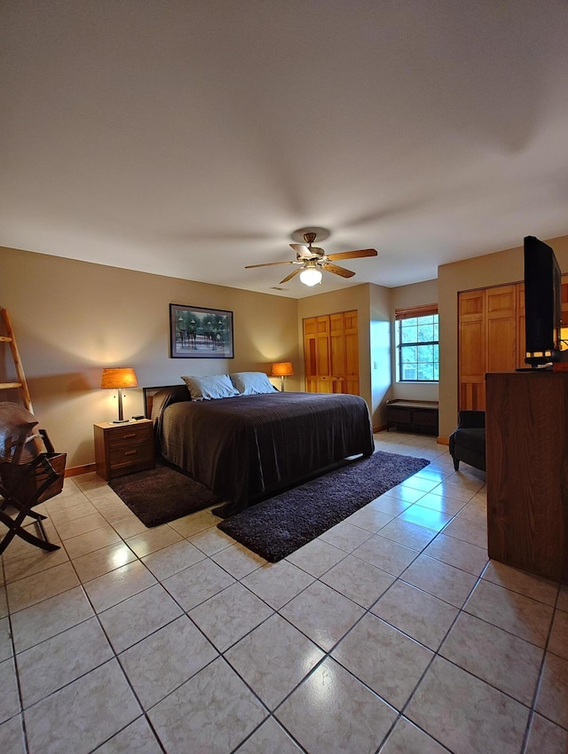 156 Pine View Ln, Copperhill, TN 37317 - bedroom featuring light tile patterned floors and a ceiling fan
