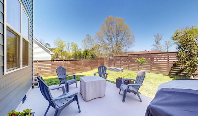 view of patio featuring a fenced backyard