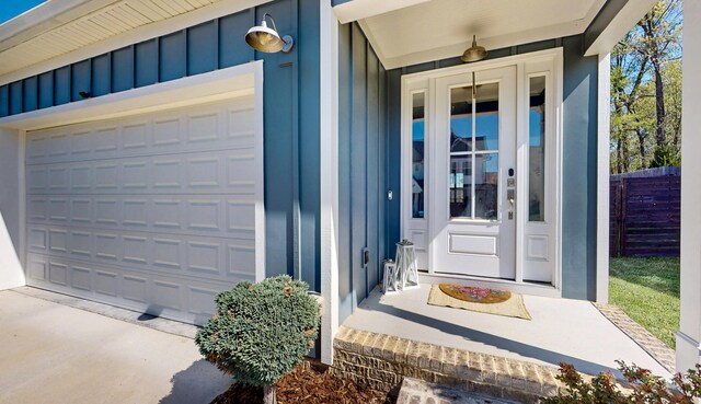 doorway to property with board and batten siding