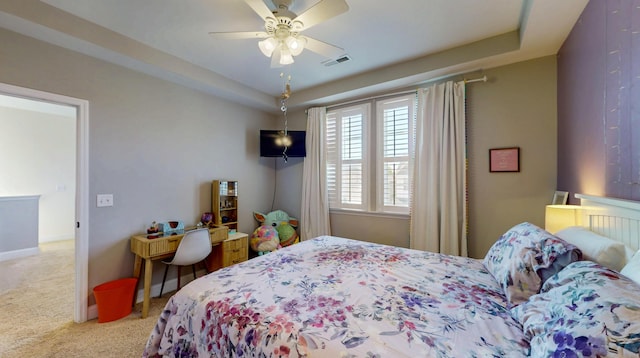 bedroom with carpet floors, baseboards, a ceiling fan, and visible vents