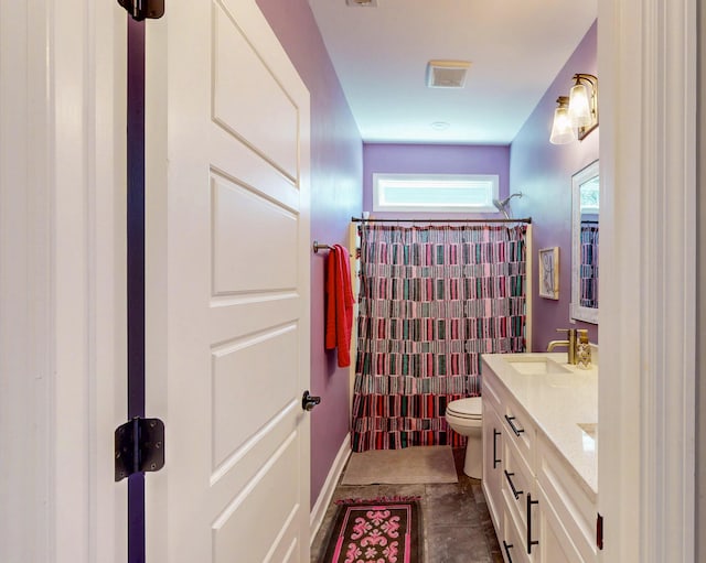bathroom with a shower with curtain, vanity, tile patterned flooring, visible vents, and toilet