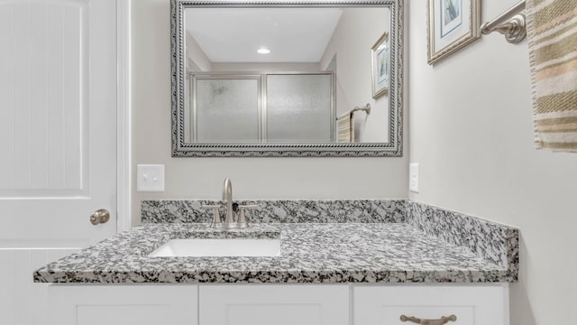 1605 Orchard Pl NE, Cleveland, TN 37323 - full bath featuring vanity, a shower with shower door, and recessed lighting