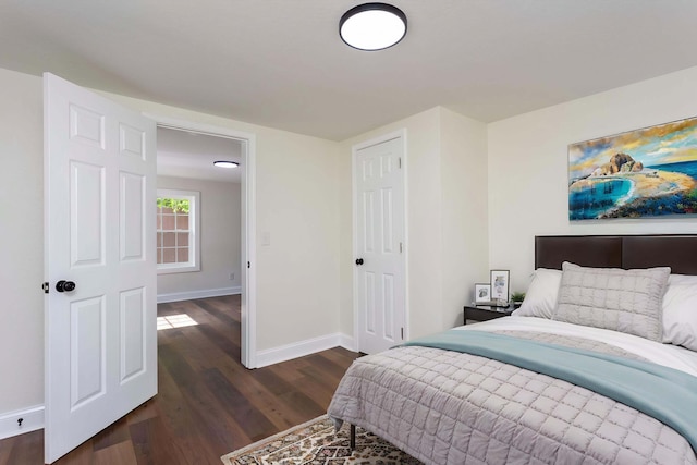 245 Graham St, Dayton, TN 37321 - bedroom featuring dark wood-style flooring and baseboards