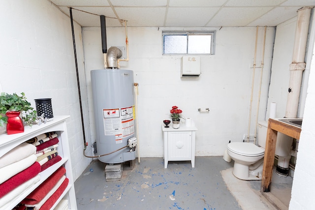 utility room with gas water heater