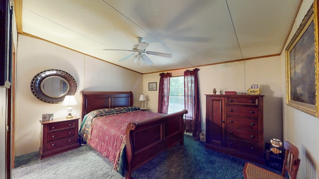 carpeted bedroom with ceiling fan and crown molding