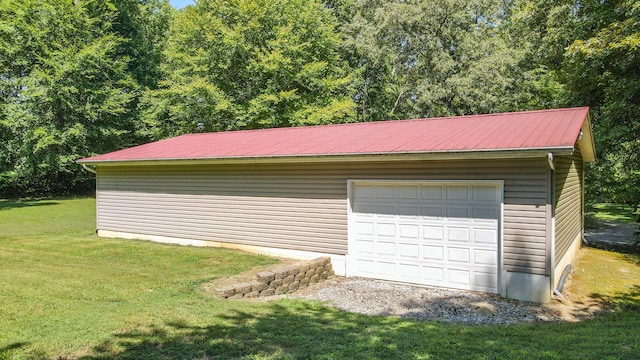 garage with a lawn