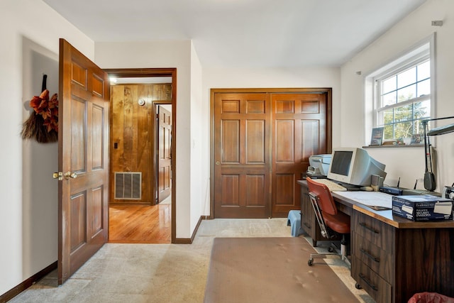 view of carpeted home office