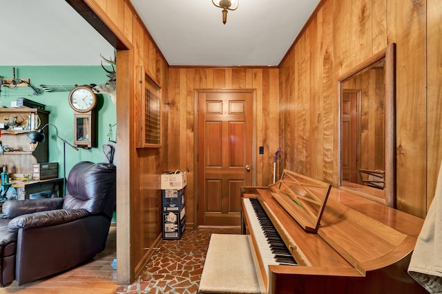 miscellaneous room with wooden walls