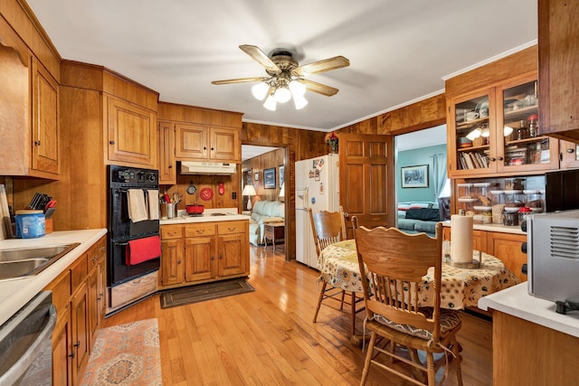 kitchen featuring double oven, dishwasher, white fridge with ice dispenser, crown molding, and light wood-type flooring