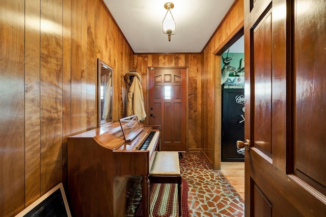 doorway with wooden walls