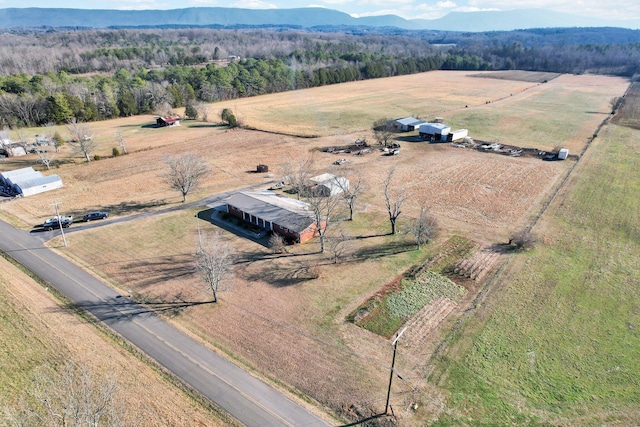 aerial view featuring a rural view and a mountain view