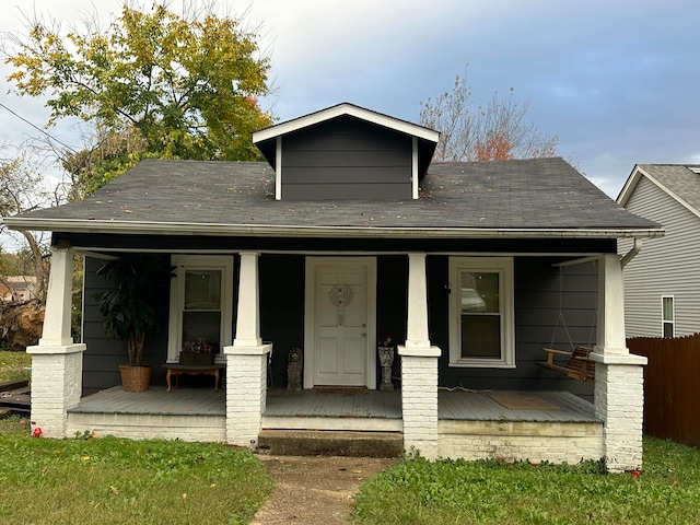 bungalow-style home with a porch