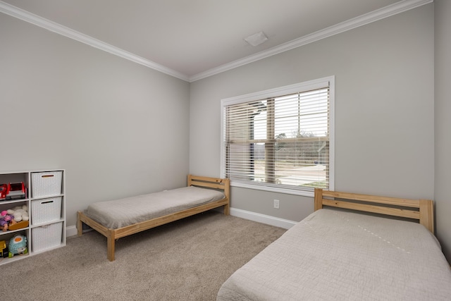 carpeted bedroom with baseboards and ornamental molding