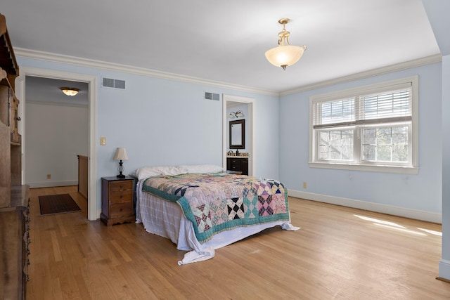 bedroom featuring visible vents, light wood finished floors, and ornamental molding