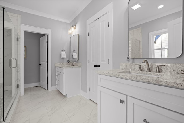 full bathroom with marble finish floor, ornamental molding, a sink, and a marble finish shower