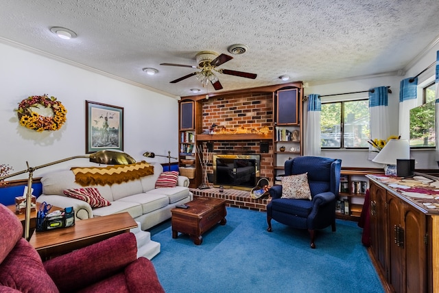 carpeted living room with a fireplace, a textured ceiling, and ornamental molding