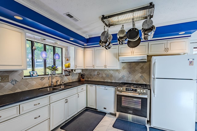 kitchen with white appliances, crown molding, sink, decorative backsplash, and light tile patterned floors