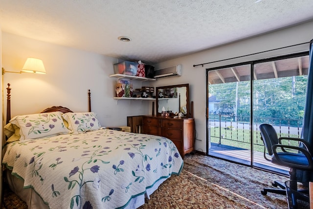 carpeted bedroom featuring a textured ceiling, access to exterior, a wall mounted AC, and multiple windows