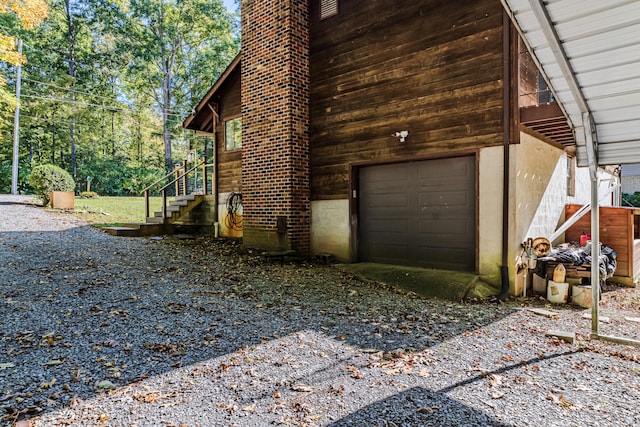 view of property exterior with a garage