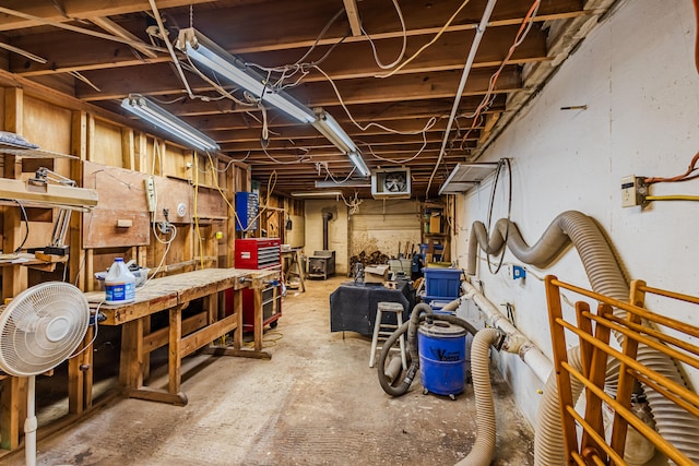 basement with a workshop area