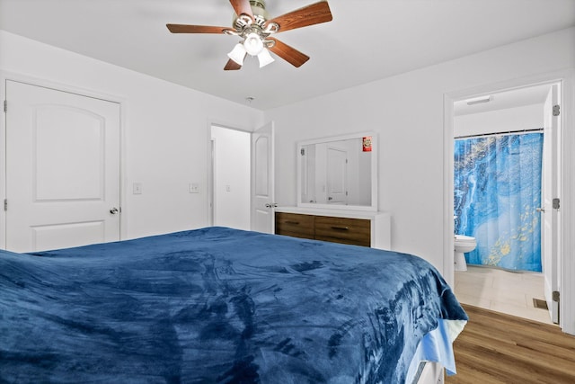 128 Mountain Breeze Ave, Dayton, TN 37321 - bedroom featuring ensuite bathroom, wood finished floors, and a ceiling fan